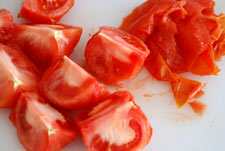 Cortar tomates para confitar